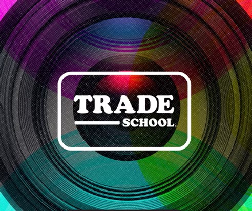 Trade school logo displayed on a vibrant, colorful background.