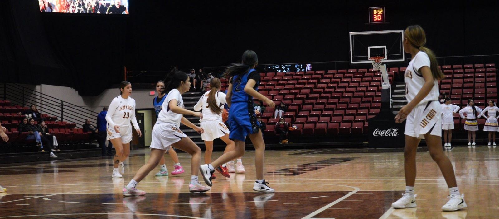 Takini Lady Skyhawks basketball team on the court