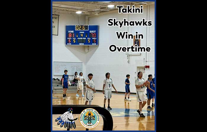 The Takini Skyhawks basketball team on the court.