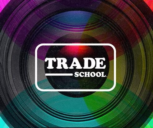 Trade school logo displayed on a vibrant, colorful background.